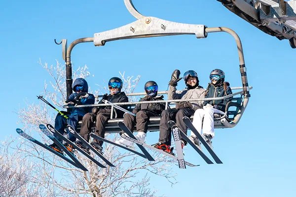 Group of skiers and riders at Jiminy Peak