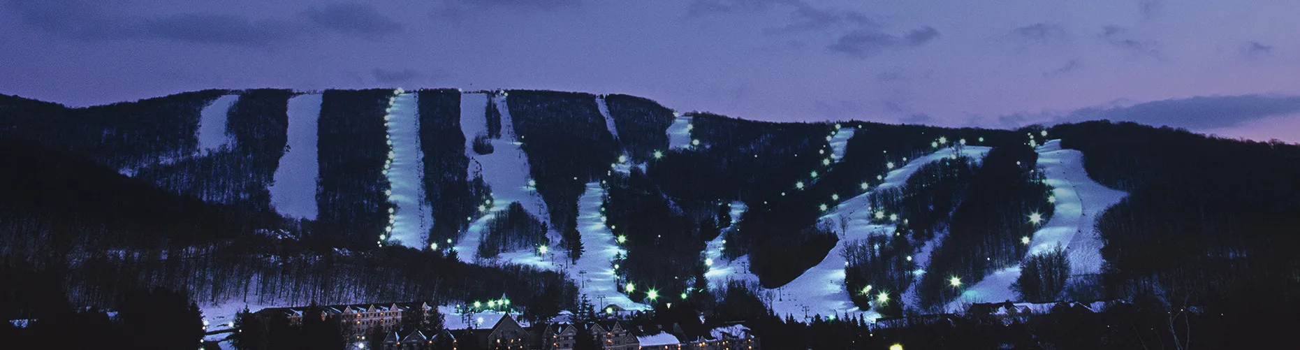 Night view of Jiminy Peak