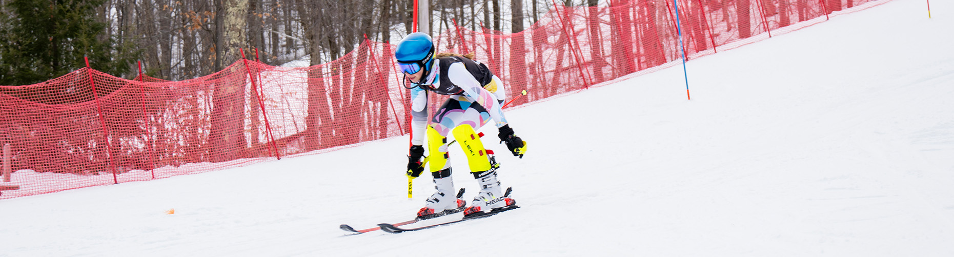 You ski racer going through gates