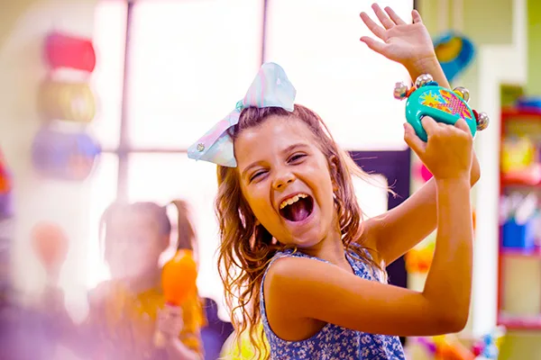 A girl playing at the Jiminy Peak Cub's Den